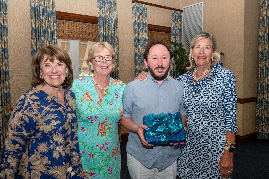 Pam Larrick, Cathy Cronin, and Susie Kintner presented guest speaker Dave Miller with a gift.  